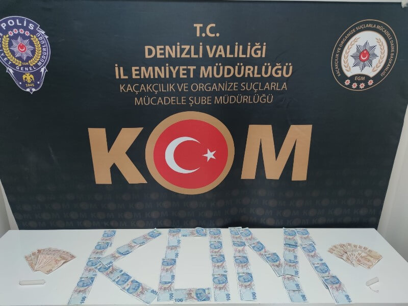 Denizli'de sahte paraları mumlayarak piyasaya sürmeye çalışan 2 zanlı yakalandı
